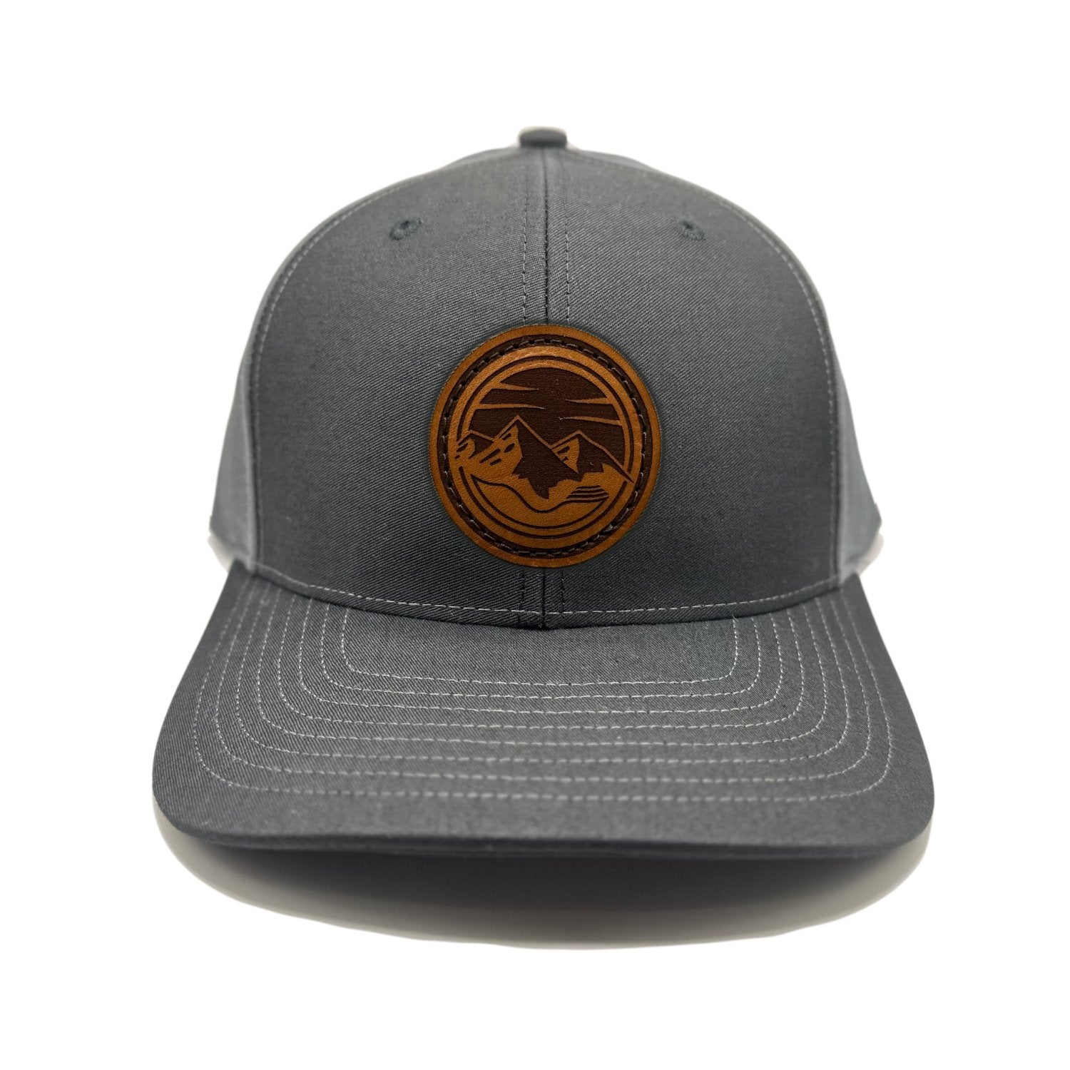 Front view of the Mountain Lake leather patch hat on Richardson 312 in Black/Charcoal, featuring a six-panel, mid-profile design with a pre-curved visor and real leather patch showcasing the Mountain Lake design. Ideal for outdoor enthusiasts.