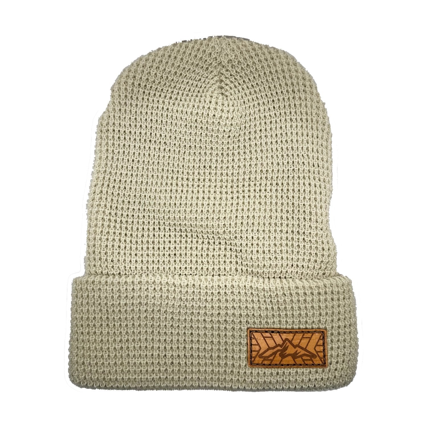 Leather Patch Stocking. We have sewn on a leather patch that is made of Full grain, Veg tanned, High-quality leather. The Mountain Top image is laser engraved. Handmade in Colorado, USA patch, stitched onto a Richardson khaki Beanie hat.