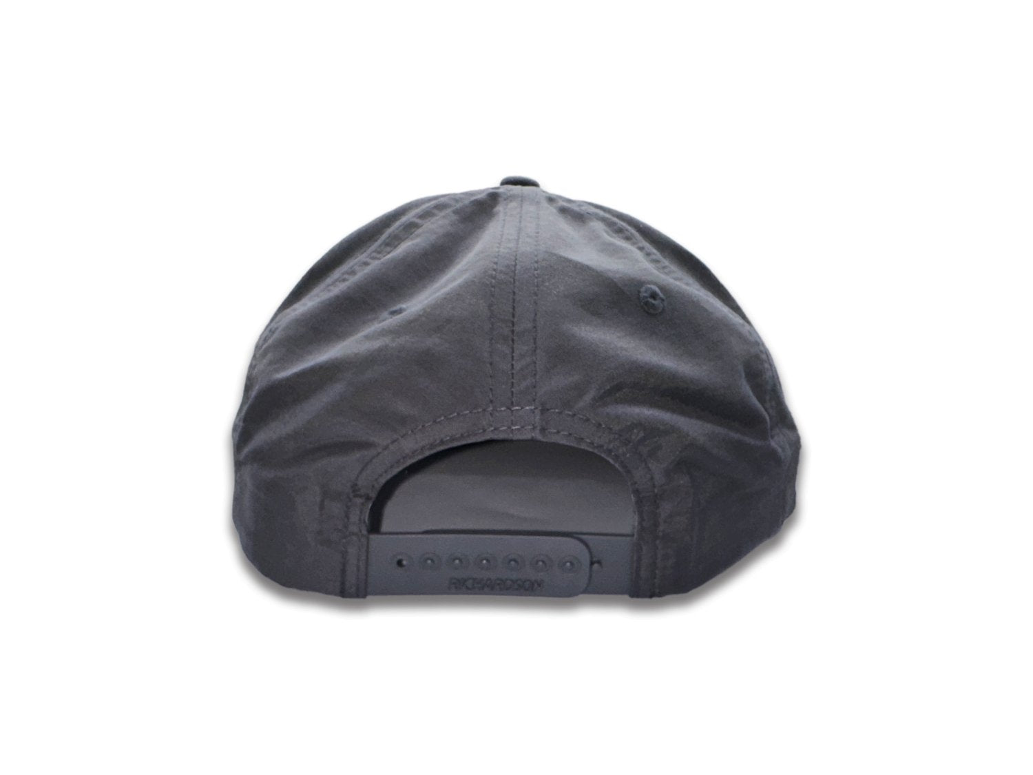 A SnapBack Richardson hat features an adjustable design that allows for a customizable fit. The hat is equipped with plastic snaps on the back, which can be easily adjusted to different sizes by snapping or unsnapping them. This adjustable feature ensures a secure and comfortable fit for various head sizes, making the SnapBack Richardson hat a versatile and practical choice for anyone looking for a personalized fit.