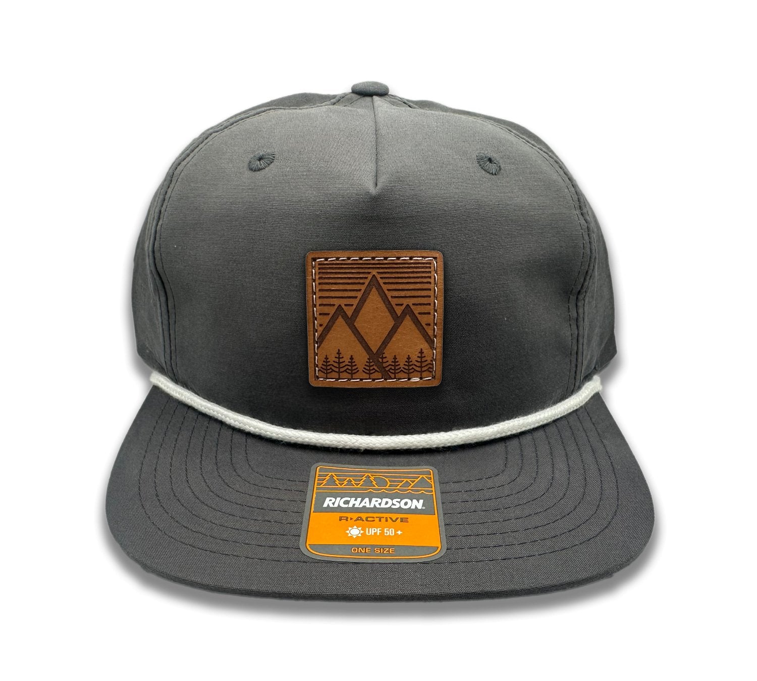 Front view of the Mountain West leather patch hat on Richardson 256 Umpqua in Charcoal/White, featuring a low profile, five-panel design with a distinctive rope accent and laser-engraved leather patch. Ideal for mountain man apparel lovers