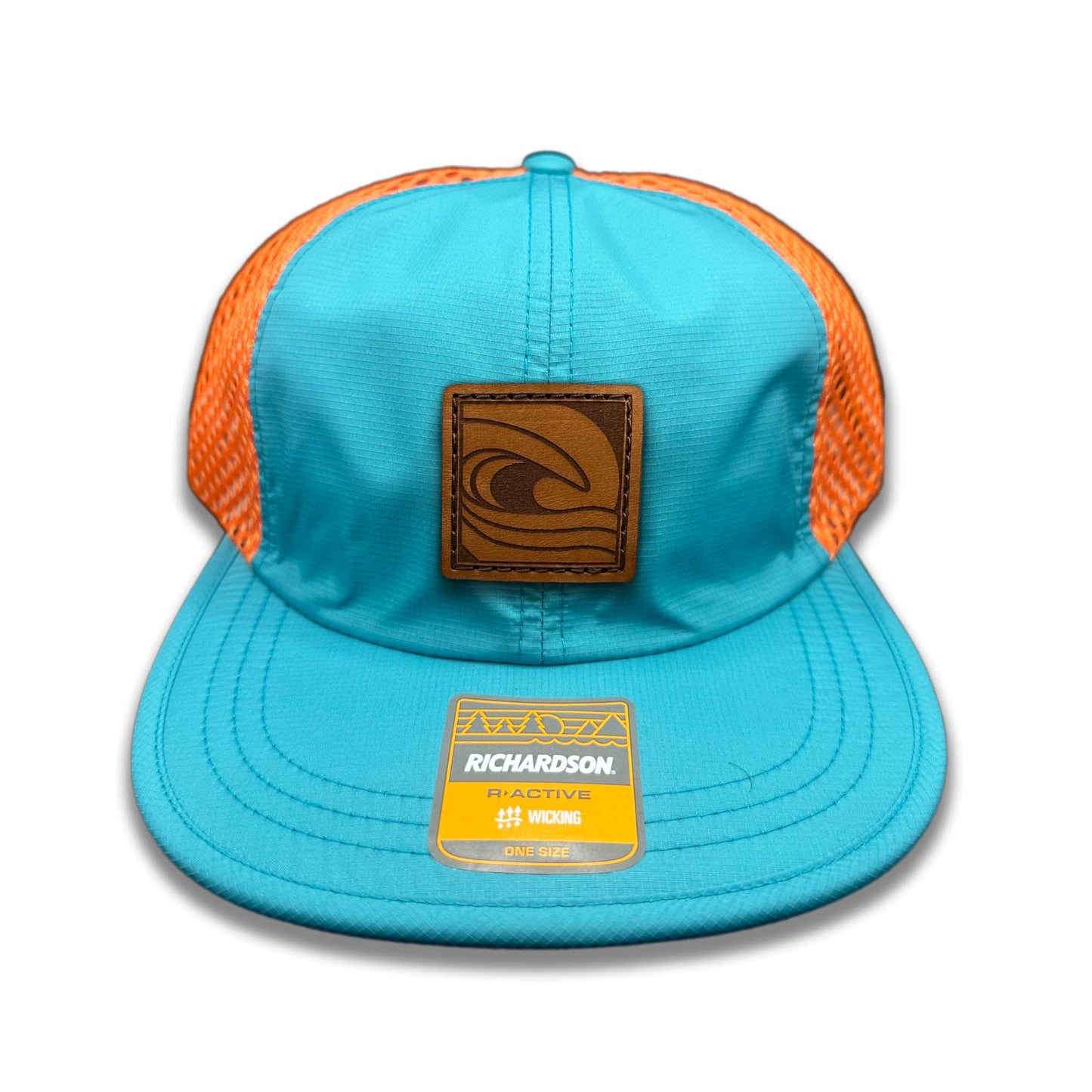 Front view of the Ocean Swell Hat by Outer Wings in Teal/Orange, crafted on a low profile Richardson 935 with a square patch featuring a captivating ocean wave design. Perfect for those seeking a custom leather patch hat with a coastal vibe.