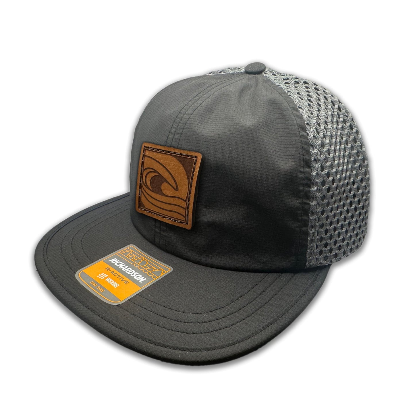 Side view of the Ocean Swell Hat by Outer Wings in Black/Charcoal, highlighting the unstructured build, wide-set mesh back, and adjustable backstrap. A lightweight and breathable performance hat ideal for all adventures.