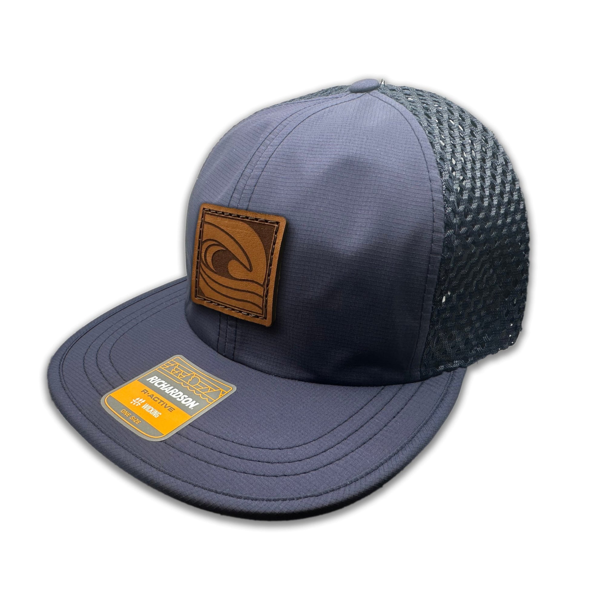 Side view of the Ocean Swell Hat by Outer Wings in Navy/Navy, highlighting the breathable mesh back, flex packable visor, and quick adjust webbing backstrap. A performance hat that combines style and function.