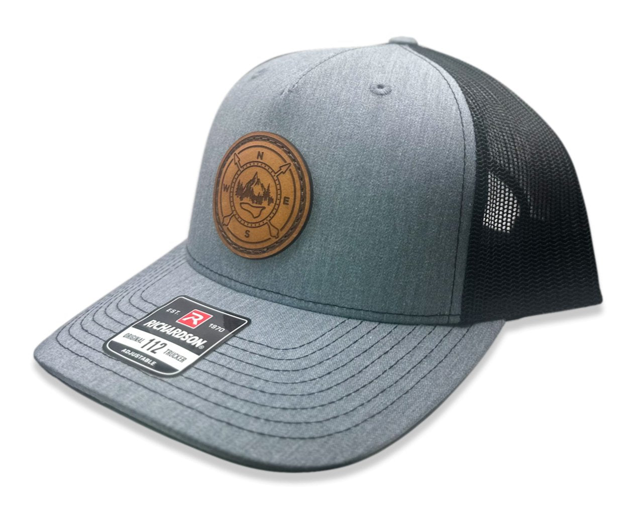 Side view of the Outdoor Compass Leather Patch Hat by Outer Wings in Heather/Black, highlighting the structured build, pre-curved visor, and adjustable SnapBack closure. A stylish and durable custom leather patch hat for adventure.