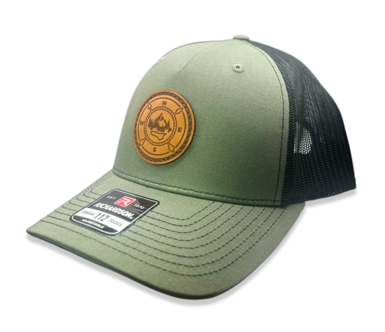 Side view of the Outdoor Compass Leather Patch Hat by Outer Wings in Loden/Black, highlighting the structured profile, breathable mesh back, and adjustable SnapBack closure. A rugged and stylish performance hat for all outdoor activities.