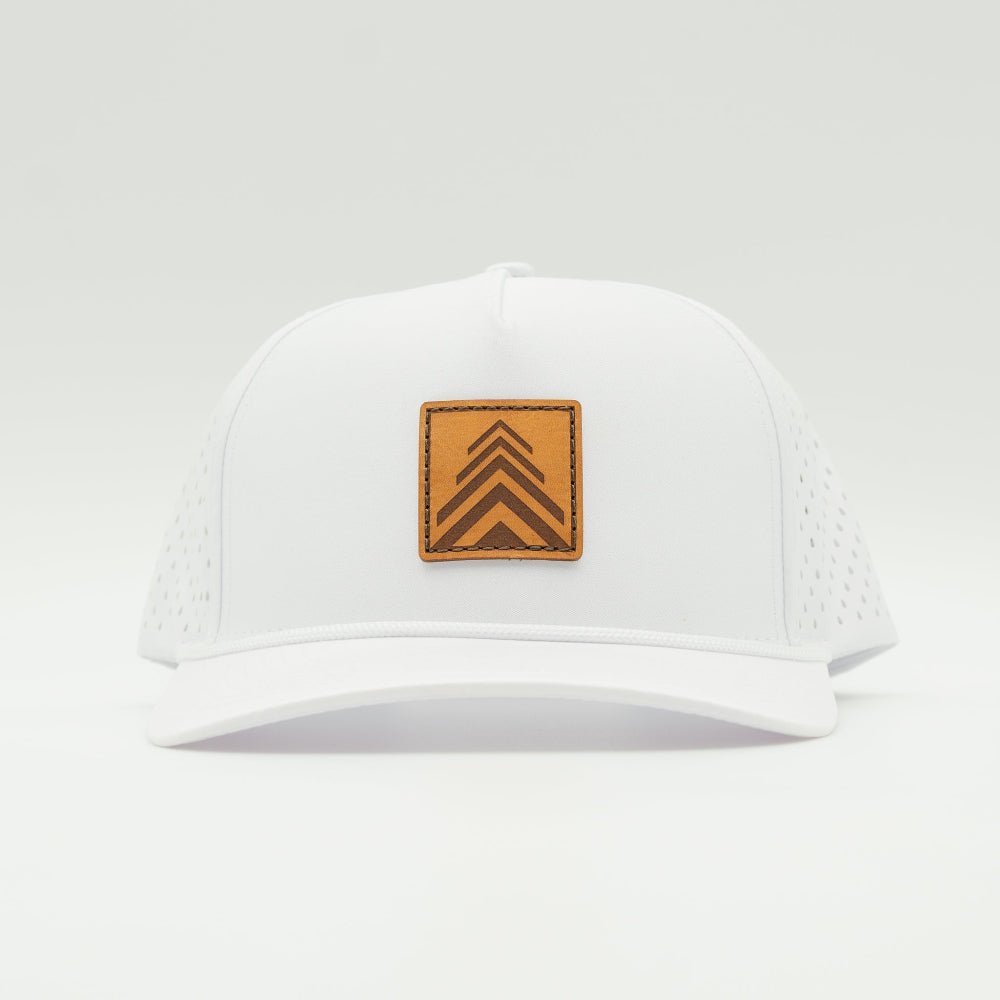 Front view of the Arrow Pine Hat by Outer Wings in white, featuring a high-profile Outer Wings 970 hat with a square leather patch showcasing a triple arrow design resembling a pine tree. The hat is made from durable, water-resistant fabric, with a structured build and classic rope detail, perfect for outdoor enthusiasts.

Color: Solid White