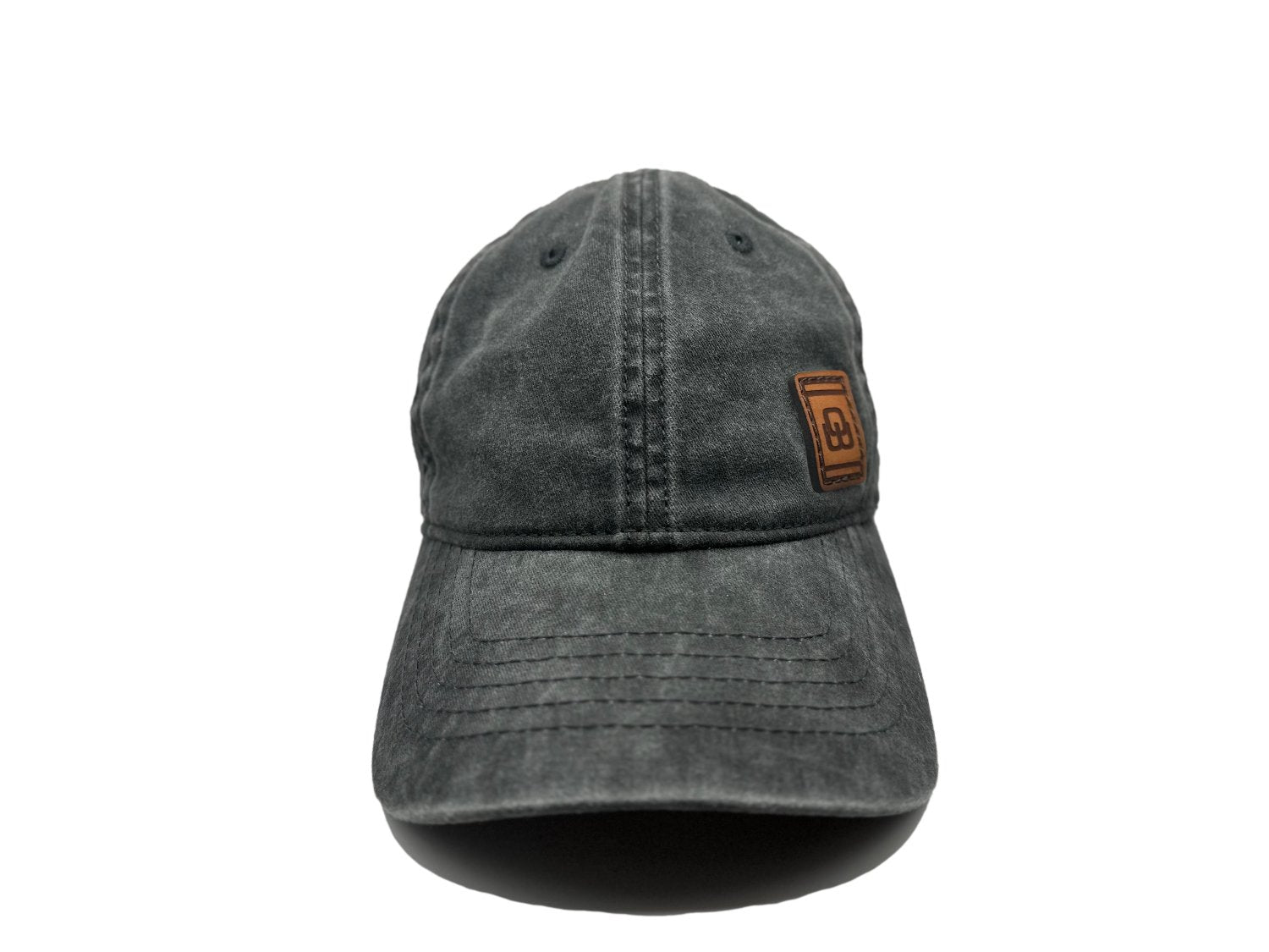 Women's baseball hat with leather patch. Our custom designed leather patch is laser engraved and sewn onto a women's cap. We use full-grain, veg tanned leather. Women's hats have a hidden pony tail opening and makeup resistant band.