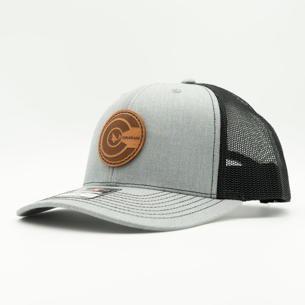 Side view of heather grey and black Richardson 112 Colorado flag leather patch hat with black mesh back and curved visor.

Color: Heather Grey/Black