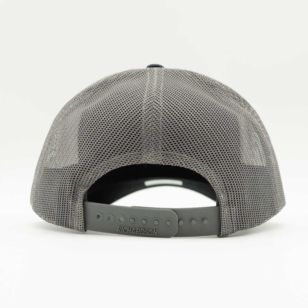 Back of Black Charcoal leather patch Richardson trucker hat with breathable mesh and snapback fit.

Color: Black/Charcoal
