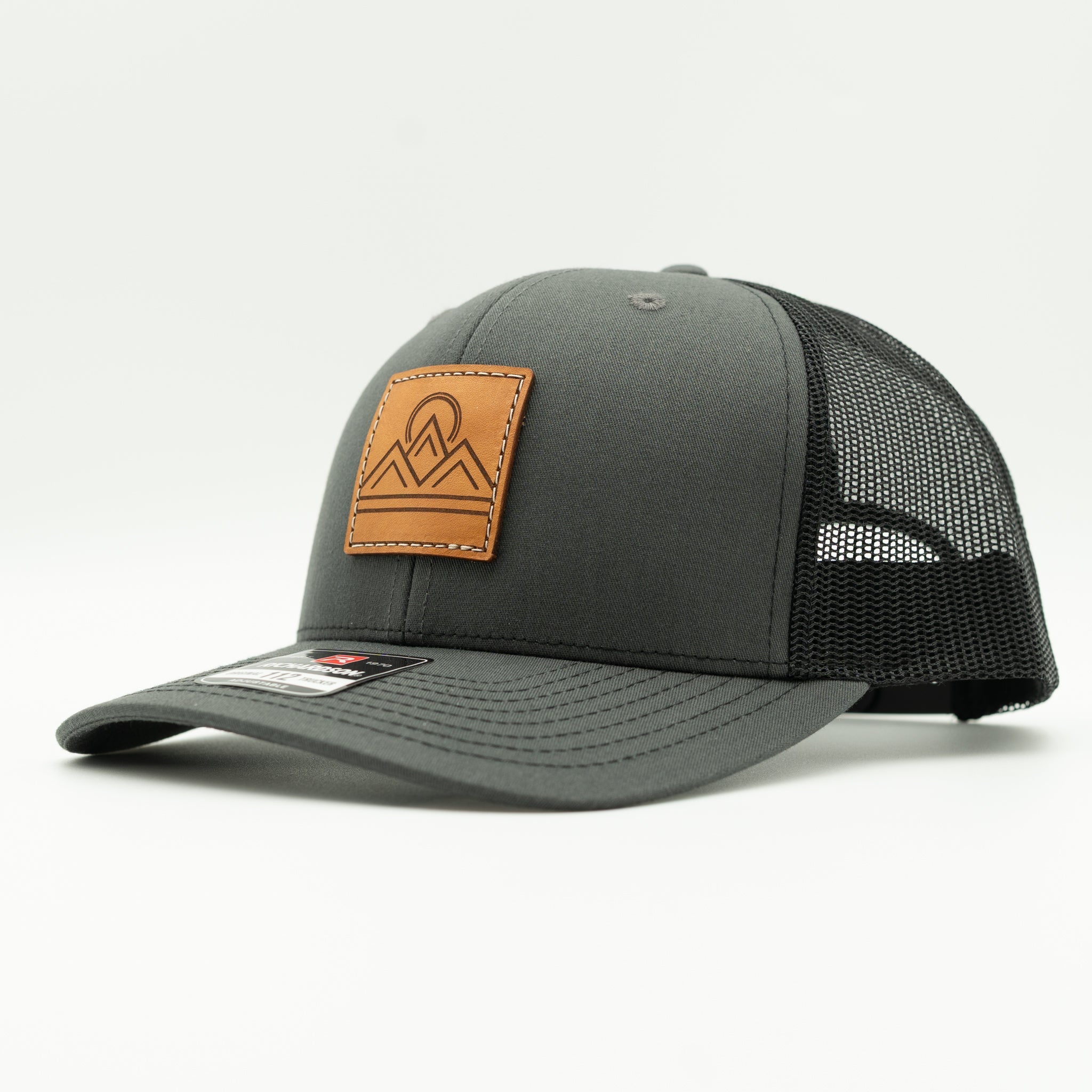 Side view of Lunar Ridge charcoal and black Richardson 112 leather patch mountain hat with black mesh back

Color: Charcoal/Black