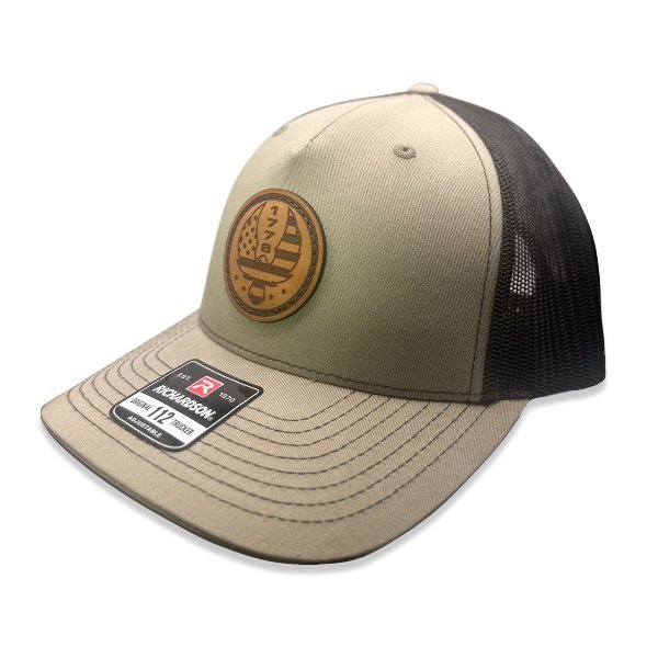 Custom Khaki/Brown Richardson Leather Patch hat. Our custom designed leather patch is laser engraved and sewn onto a Richardson 112 Hat. We use full-grain, veg tanned leather. Our custom leather patches are handmade and designed in Colorado, USA.