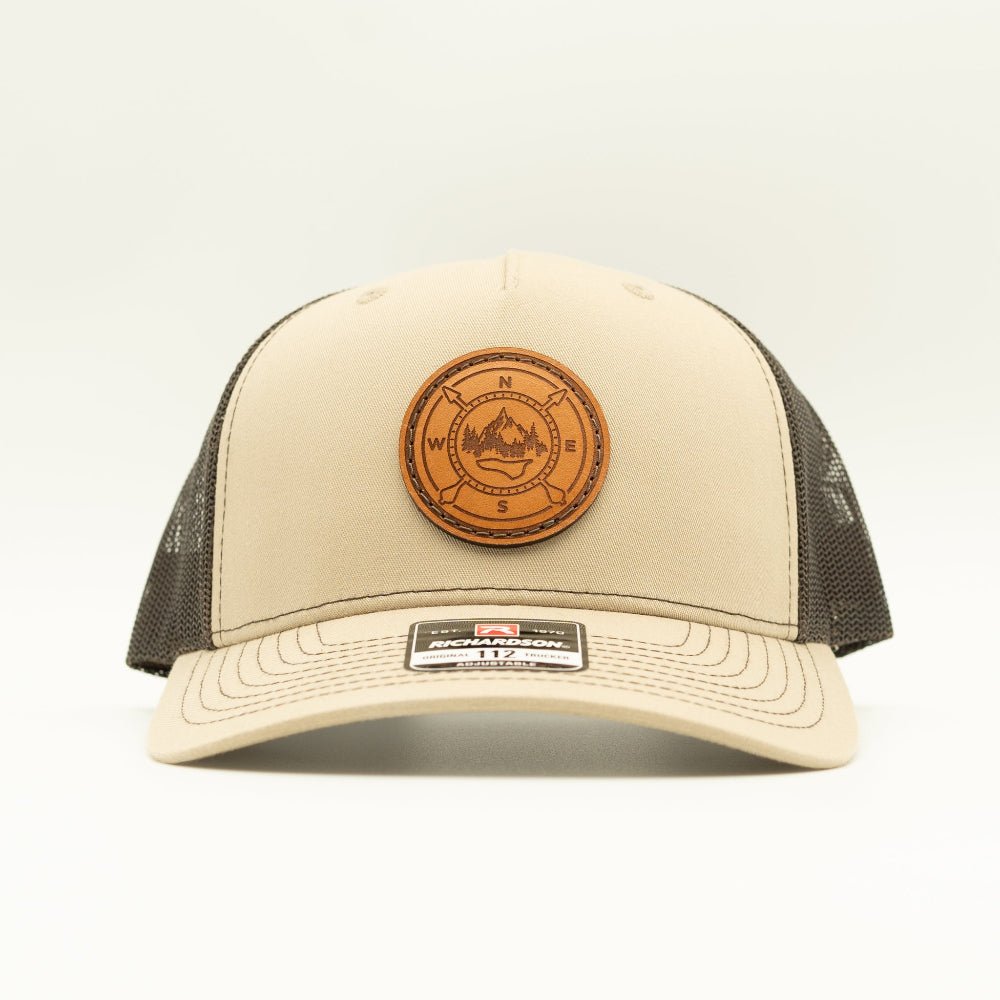 Khaki and coffee Richardson 112FP five panel trucker, front view, round compass design sewn real leather patch