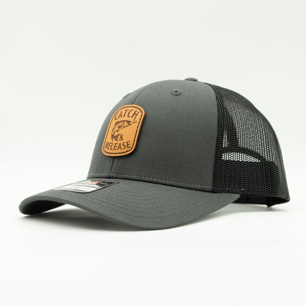 Side view of charcoal and black Richardson 115 low profile leather patch hat with Catch & Release fishing design.

Color: Charcoal/Black