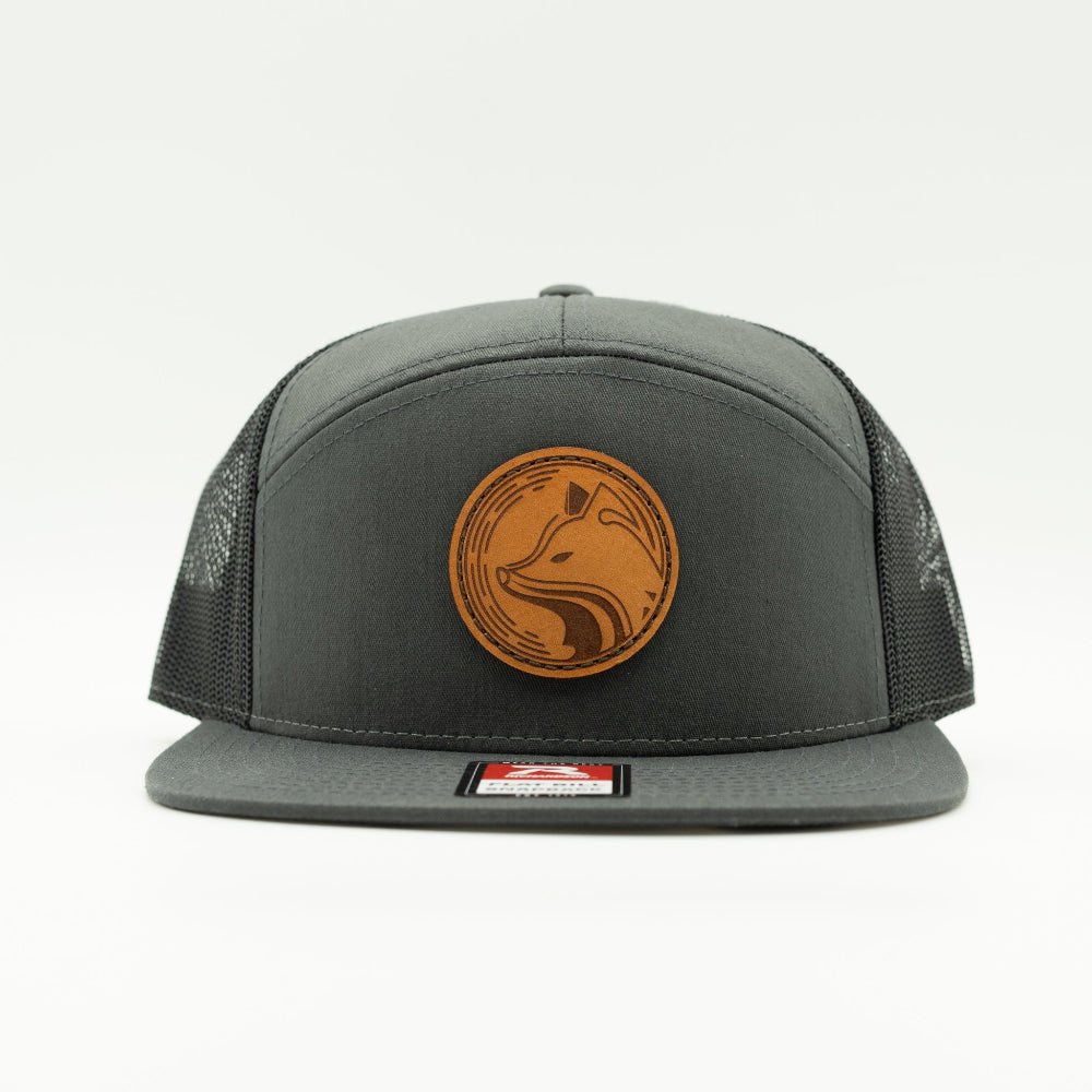 Front view of Fox Hollow leather patch hat on charcoal and black Richardson 168, flat bill, fox leather badge, and black mesh back.

Color: Charcoal/Black 168 (OSFM)