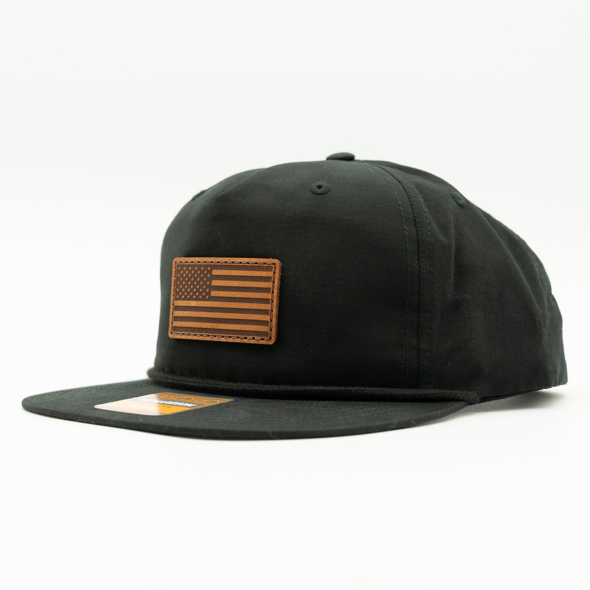 Side view of black Richardson 256 American flag rope hat with light brown leather patch and flat bill.

Color: Black
