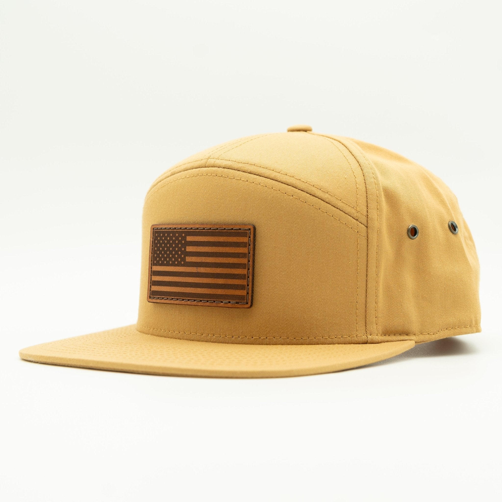 Yellow cap with American flag patch on a white background

Color: Biscuit