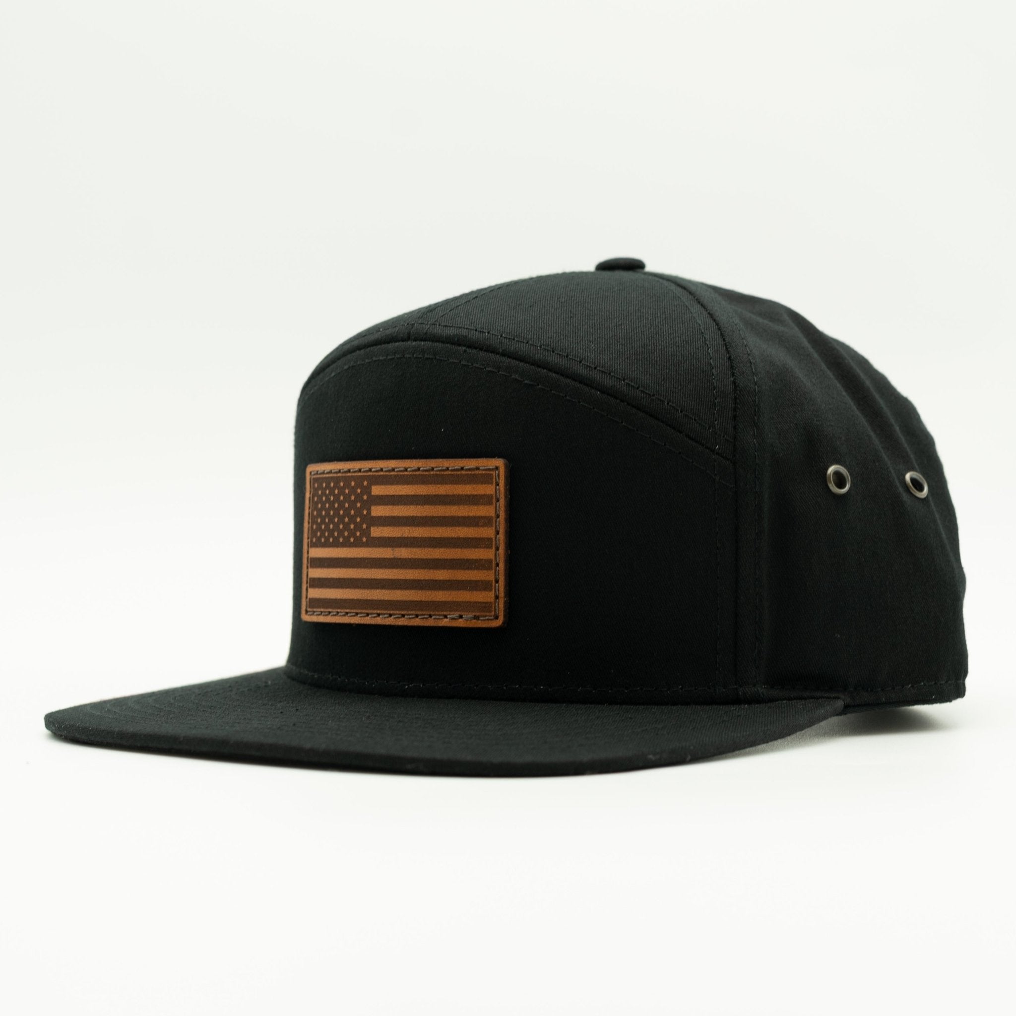 Black cap with a brown American flag patch on a white background

Color: Black