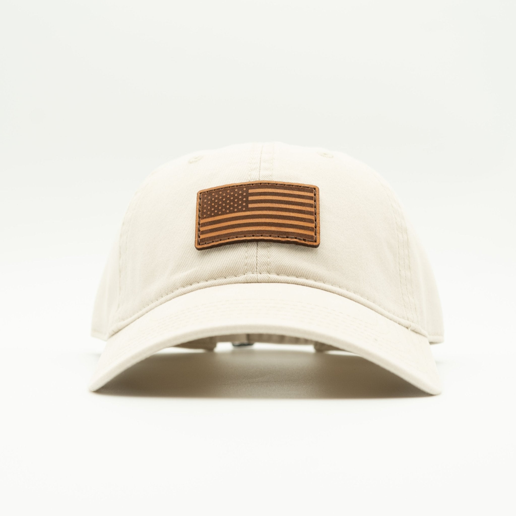 Beige cap with an American flag patch on a white background

Color: Stone