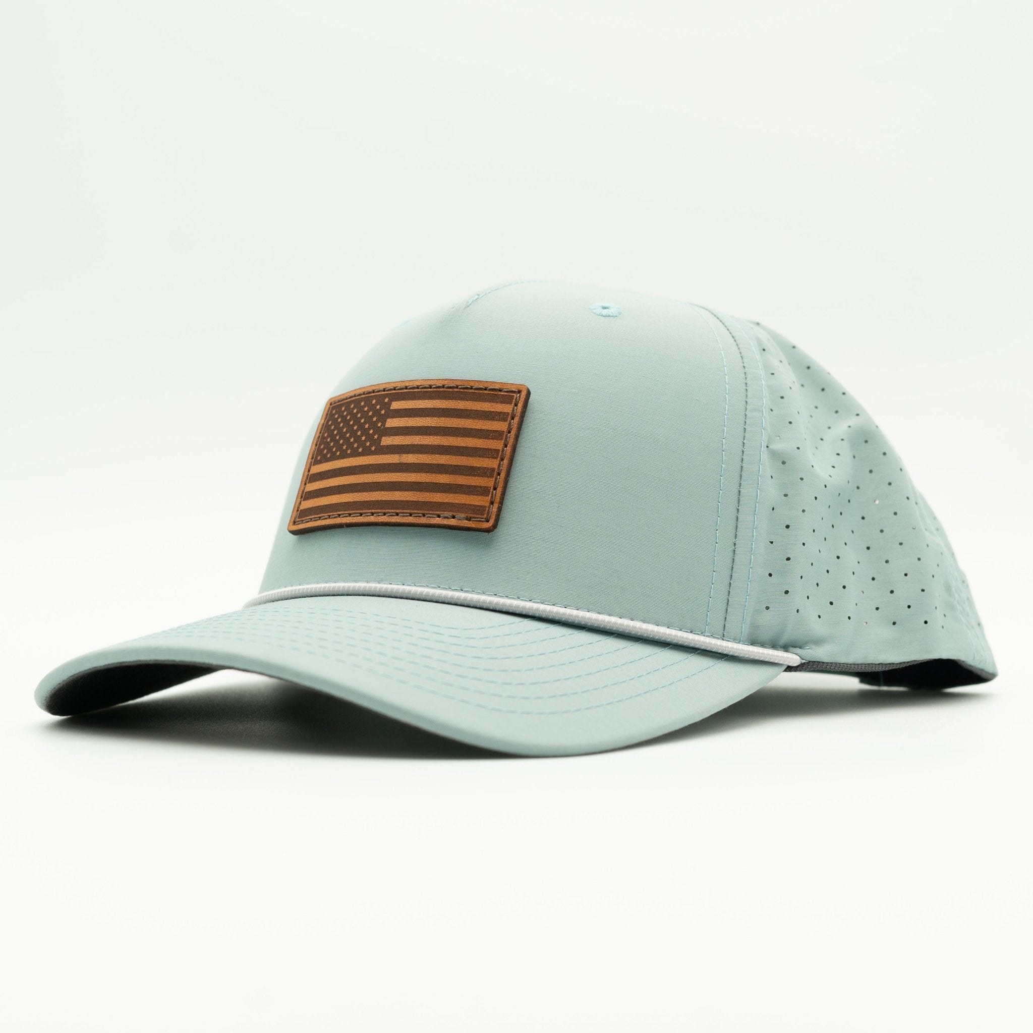 Light blue baseball cap with brown American flag patch on a white background

Color: Smoke Blue