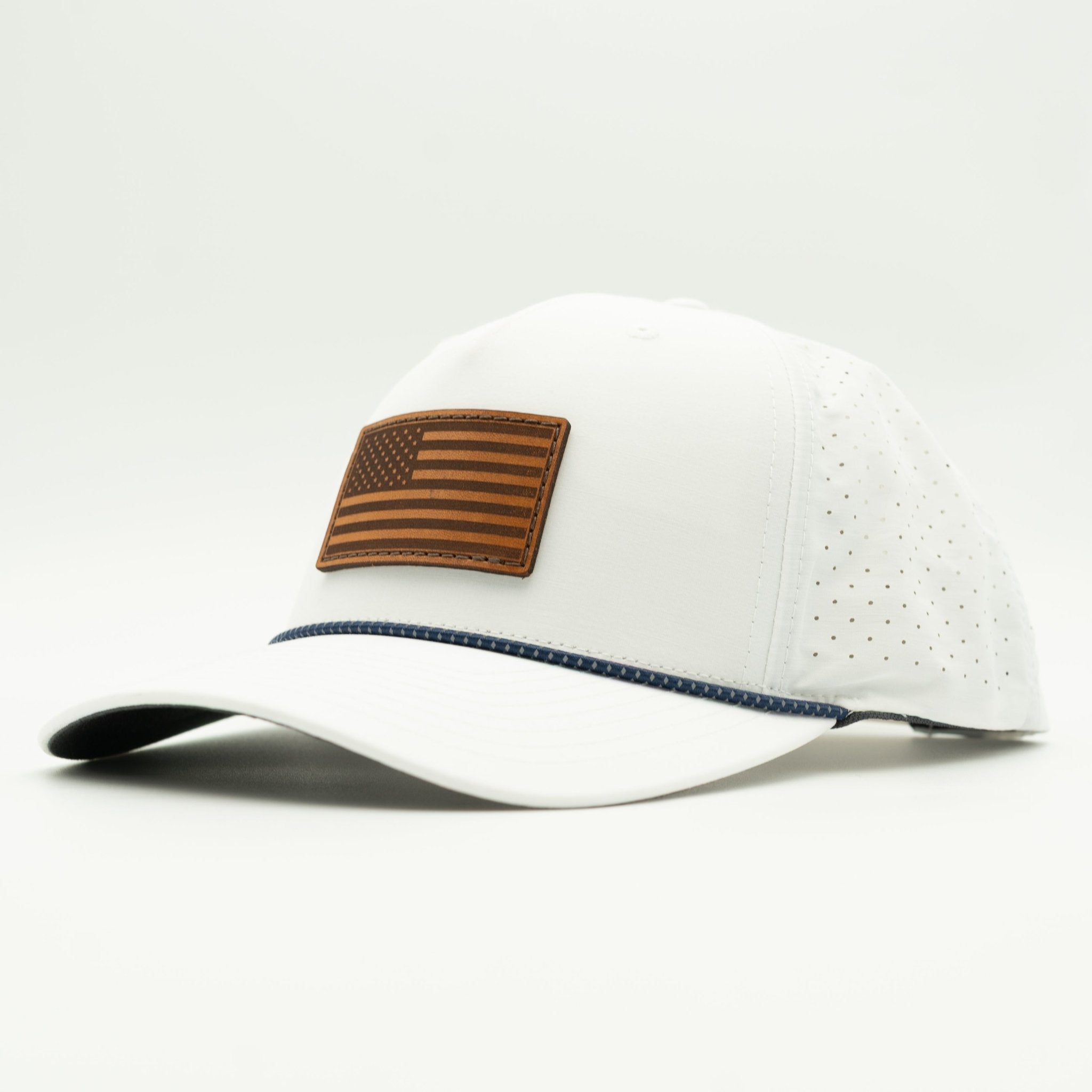 White cap with brown American flag patch on a light gray background

Color: White/Navy