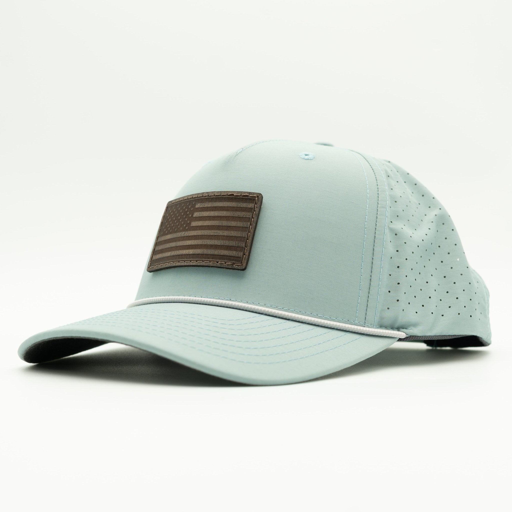 Light blue baseball cap with a brown patch on a white background

Color: Smoke Blue