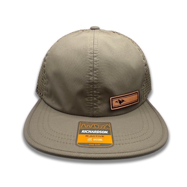 Front view of Richardson 935 hat in khaki/khaki with Active Mountain leather patch, featuring a laser-engraved mountain design.