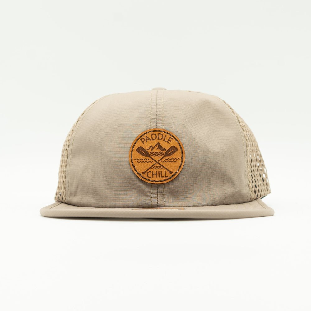 Front view of khaki Paddle and Chill circle leather patch hat, Richardson 935 performance cap for paddleboarding, kayaking and lake days.