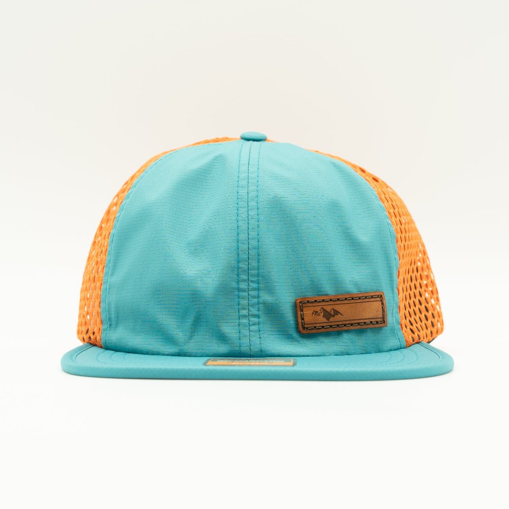 Teal and orange Richardson 935 performance hat front view featuring full grain leather Active Mountain patch, packable water resistant hiking hat

Color: Teal/Orange