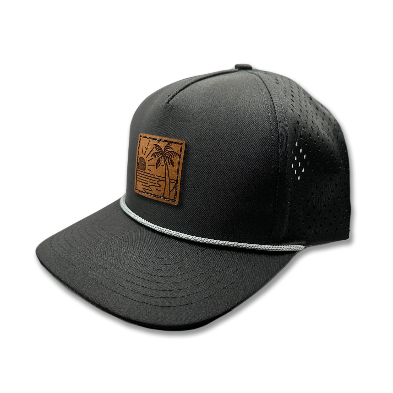 Side view of the Seaside Serenity Leather Patch Hat by Outer Wings in black, showcasing the rope detail, water-resistant fabric, and adjustable snapback closure. A rugged and stylish outdoors hat for all your adventures.