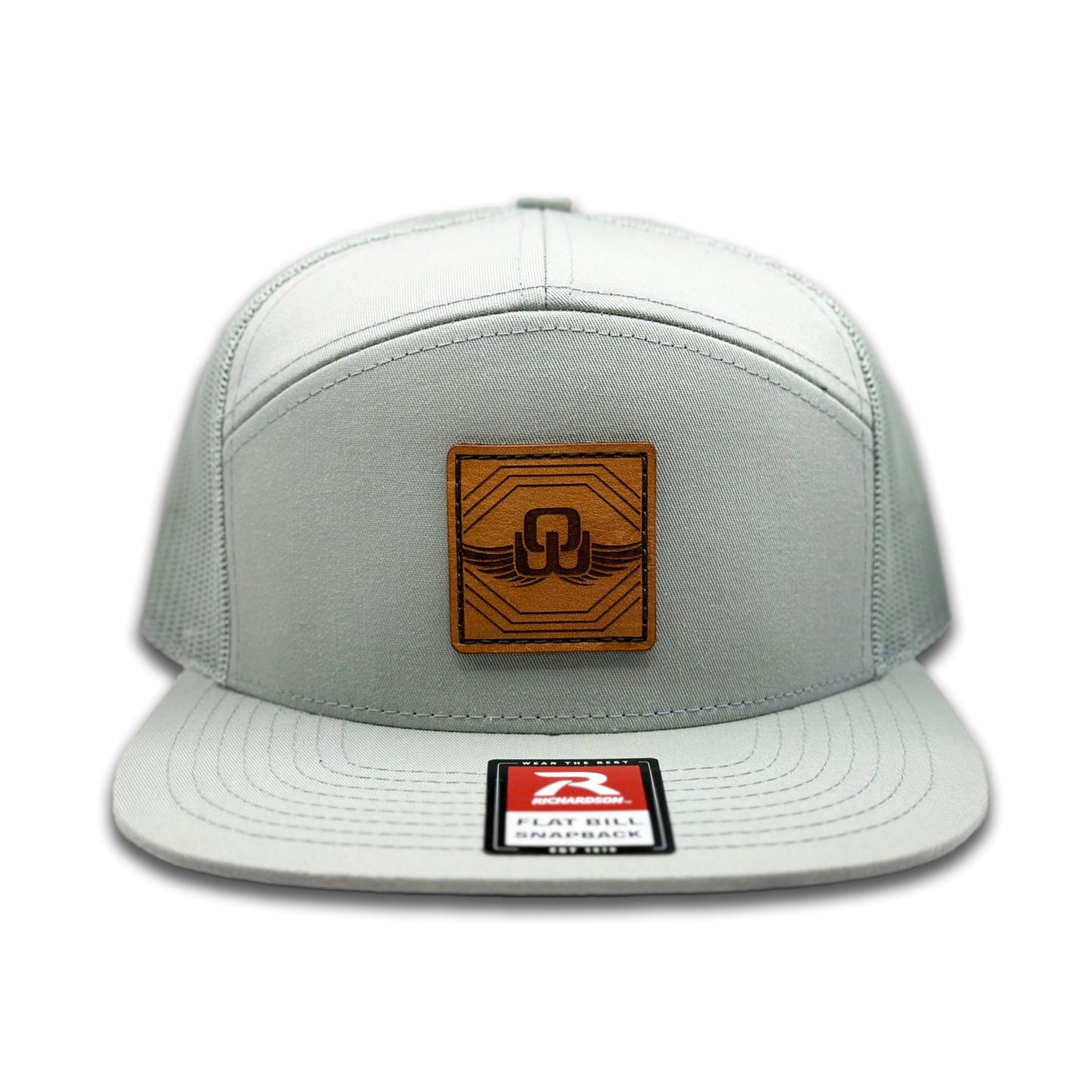 Front view of the Skybound Leather Patch Hat by Outer Wings in Quarry, featuring a high-profile, seven-panel Richardson 168 with a genuine leather patch and rugged design. Perfect for hiking, mountain adventures, and everyday wear.