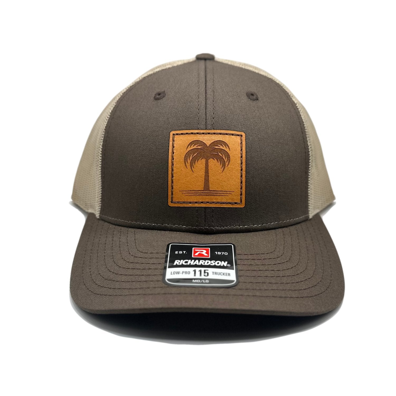 Front view of the Solo Palm Leather Patch Hat by Outer Wings in Brown/Khaki, featuring a low-profile, structured Richardson 115 hat with a hand-sewn leather patch displaying a palm tree design. Available in M/L size, ideal for outdoor enthusiasts and beach lovers.