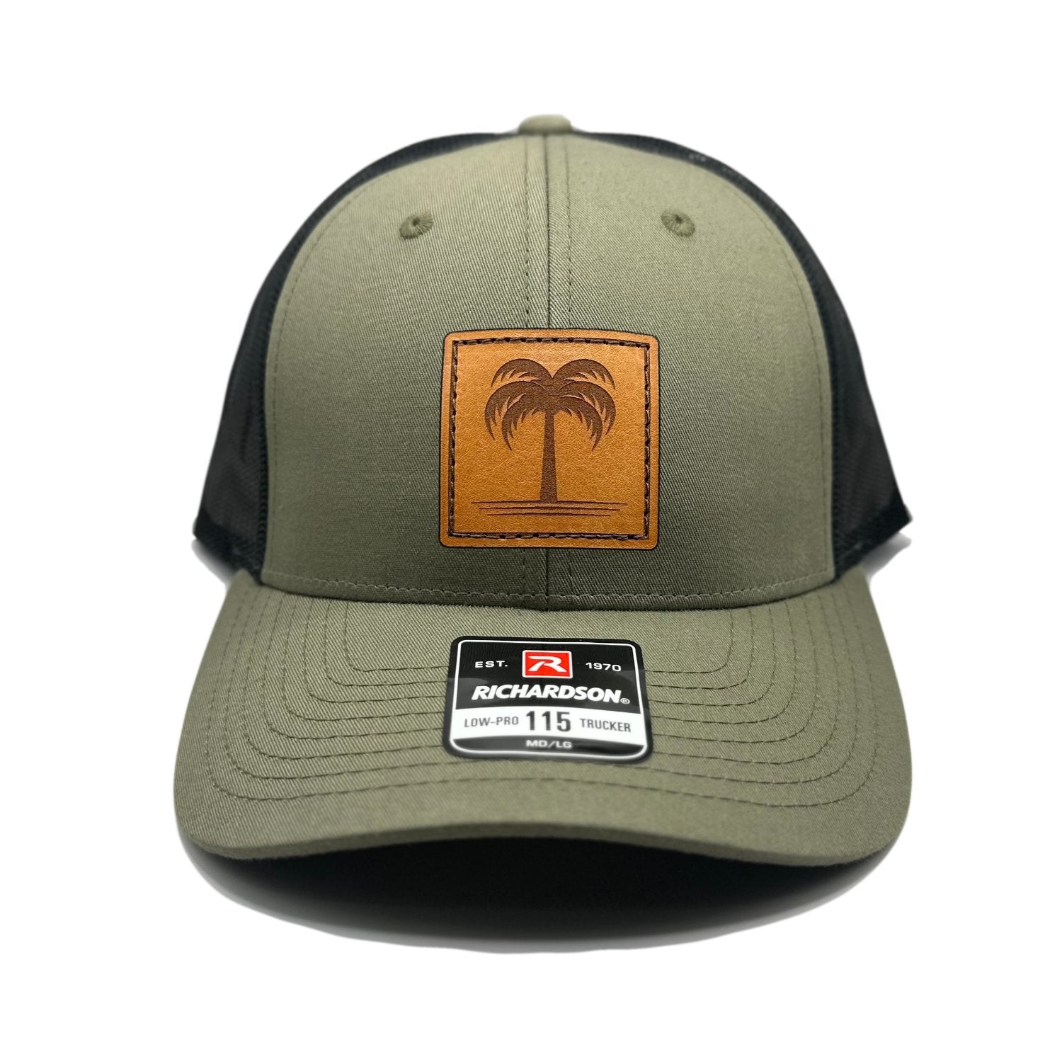 Front view of the Solo Palm Leather Patch Hat by Outer Wings in Loden/Black, crafted on a low-profile Richardson 115 with a hand-sewn leather patch featuring a single palm tree design. Available in M/L size, perfect for outdoor and casual wear.