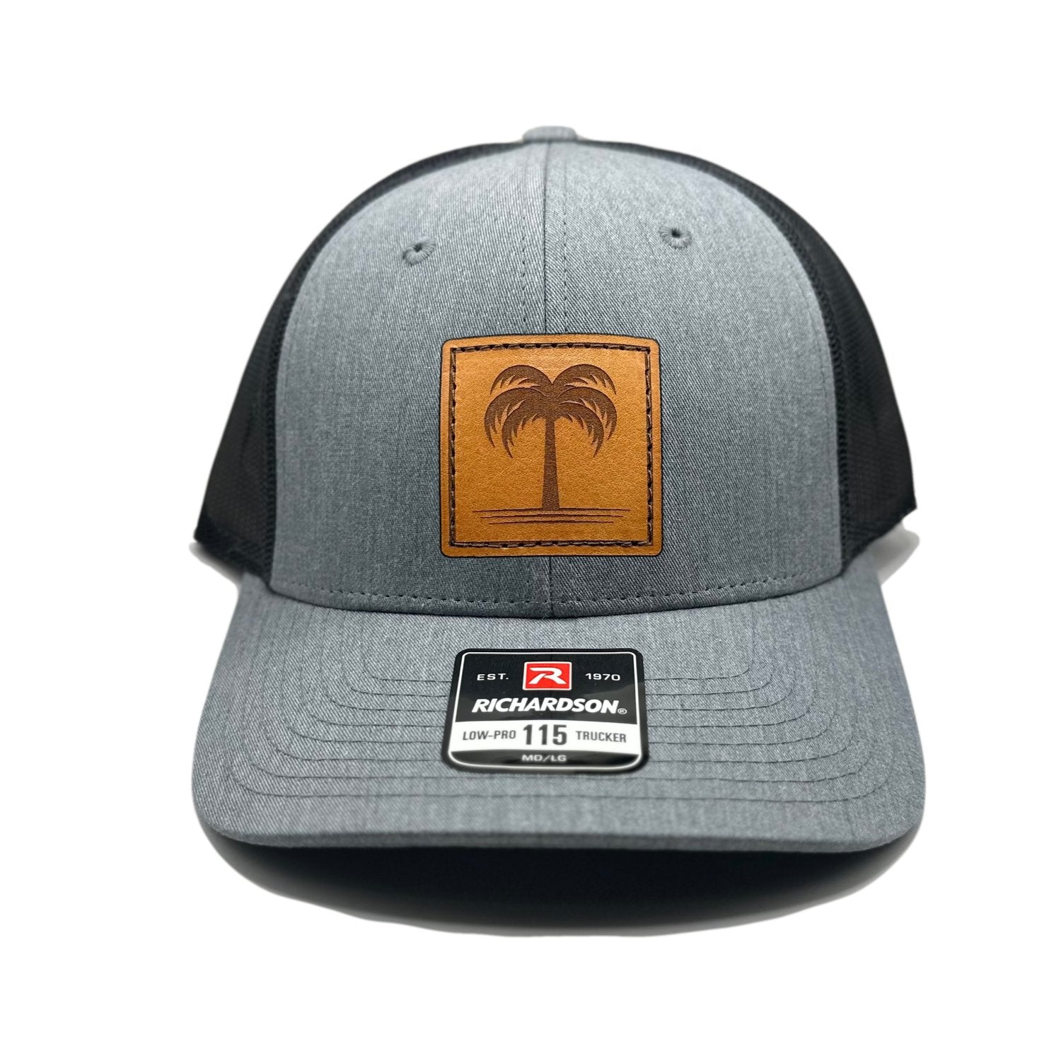 Front view of the Solo Palm Leather Patch Hat by Outer Wings in Heather Grey/Charcoal, featuring a low-profile Richardson 115 hat with a genuine leather patch of a palm tree design. Available in M/L size, perfect for everyday wear and beach adventures.