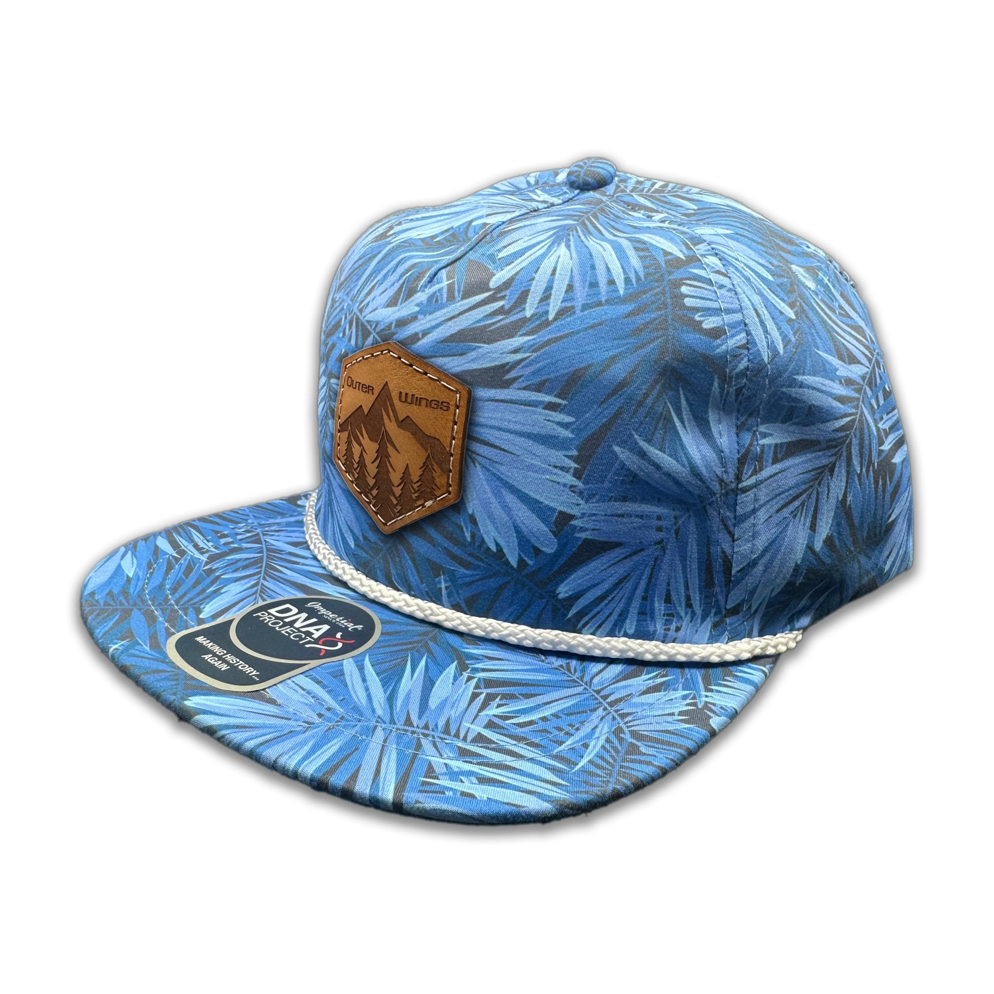 Side view of the Summit Seeker Leather Patch Hat by Outer Wings in Blue Hawaiian, highlighting the structured fit, white rope accent, and adjustable leather strap with Imperial flip buckle. A stylish and durable custom leather patch hat for nature lovers.