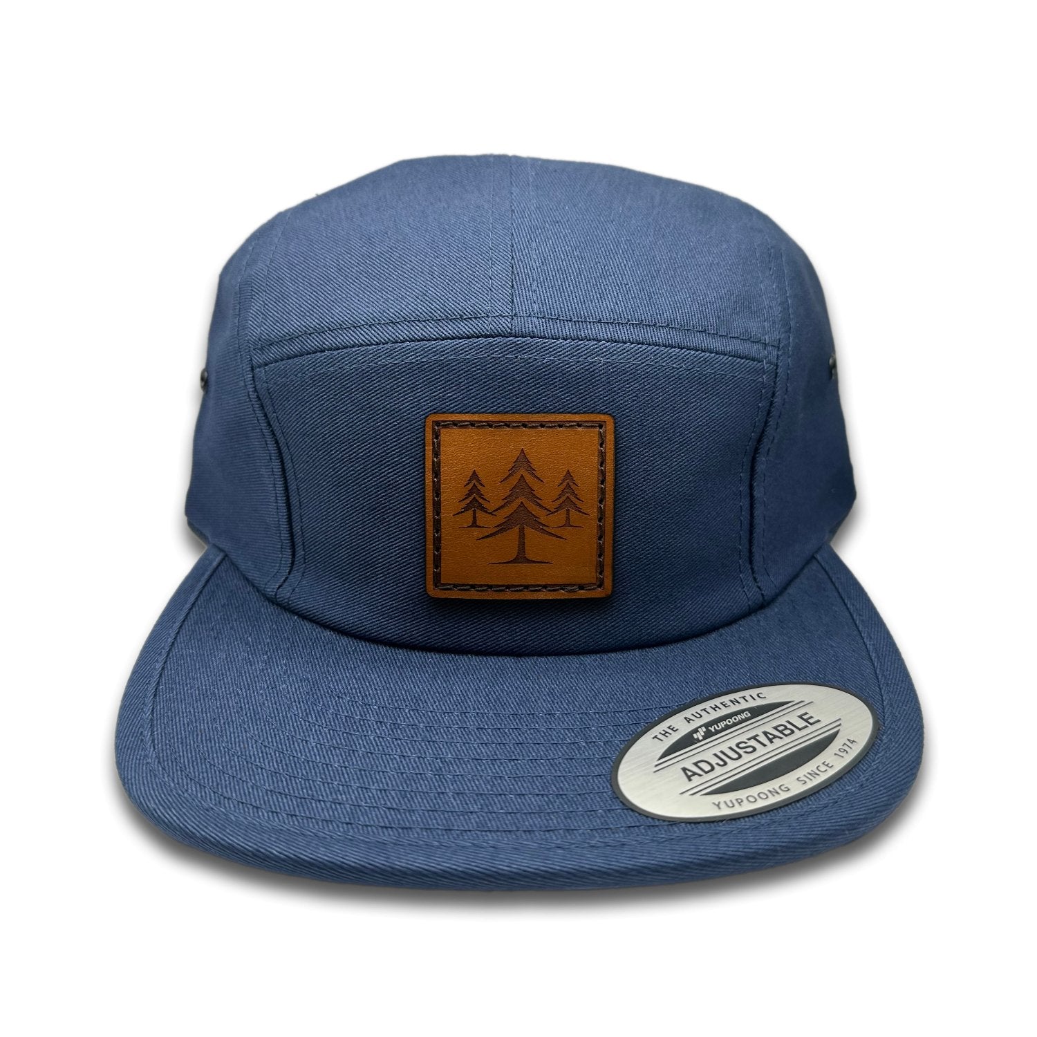 Front view of the Three Lil Pines Leather Patch Hat by Outer Wings in Navy, crafted on a low profile Yupoong 7005 jockey hat with a genuine leather patch featuring three pine trees. Ideal for outdoor activities and casual wear.