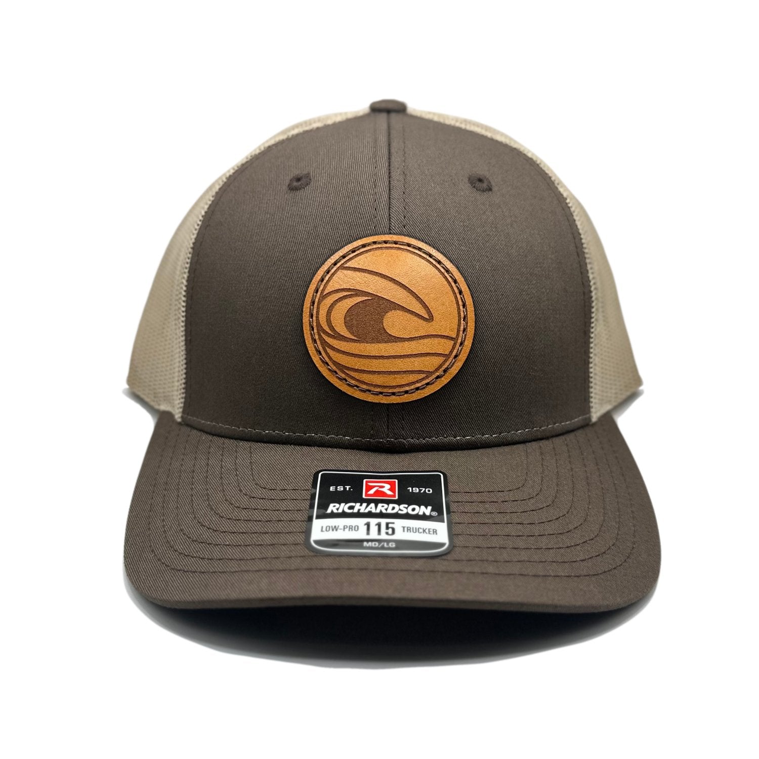 Front view of the Tidal Wave Leather Patch Hat by Outer Wings in Brown/Khaki, featuring a low profile Richardson 115 with a hand-sewn leather patch showcasing an ocean wave design. Available in M/L and Small sizes.