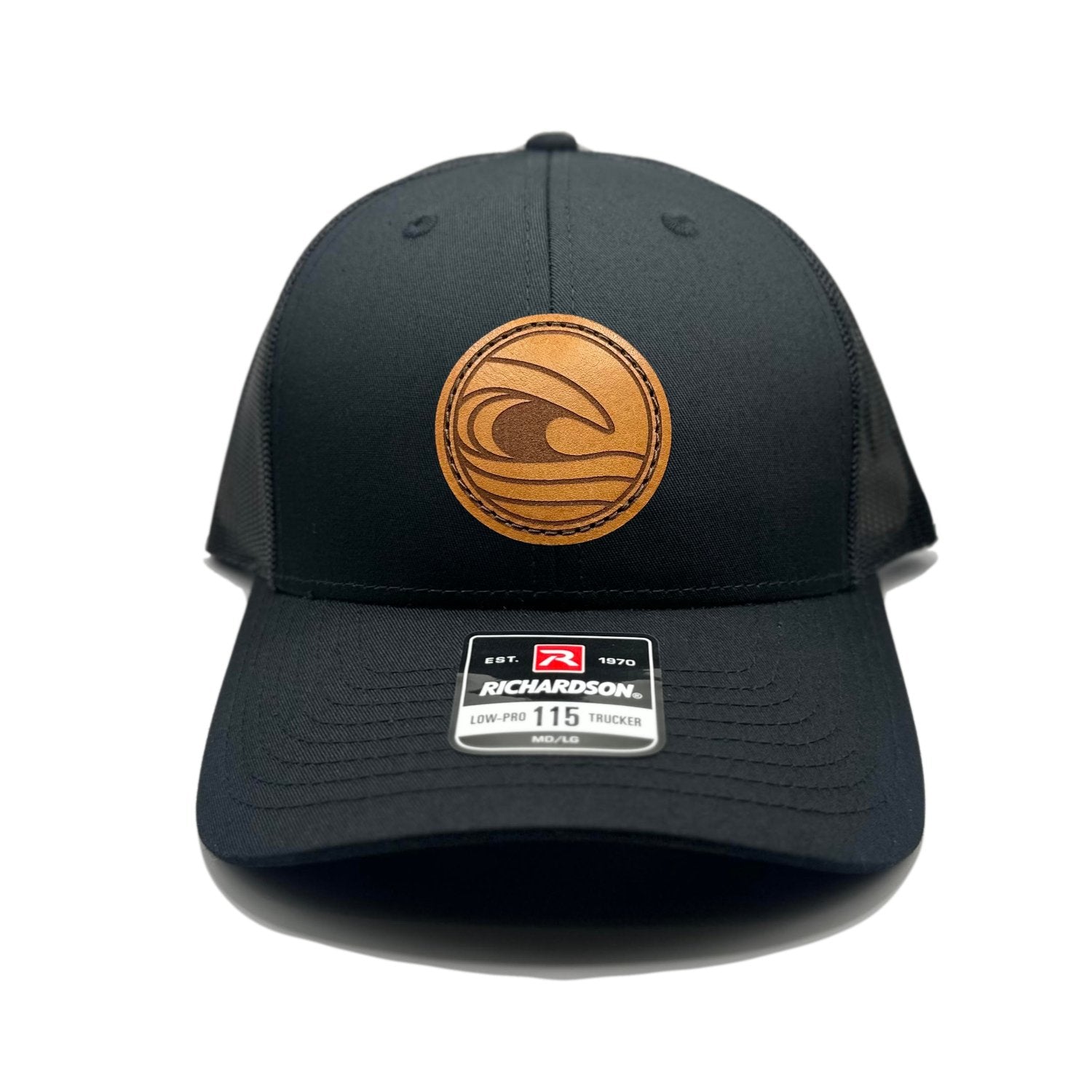 Front view of the Tidal Wave Leather Patch Hat by Outer Wings in Black/Black, featuring a low profile, six-panel Richardson 115 hat with a hand-sewn leather patch showcasing an ocean wave design. Available in M/L and Small sizes.