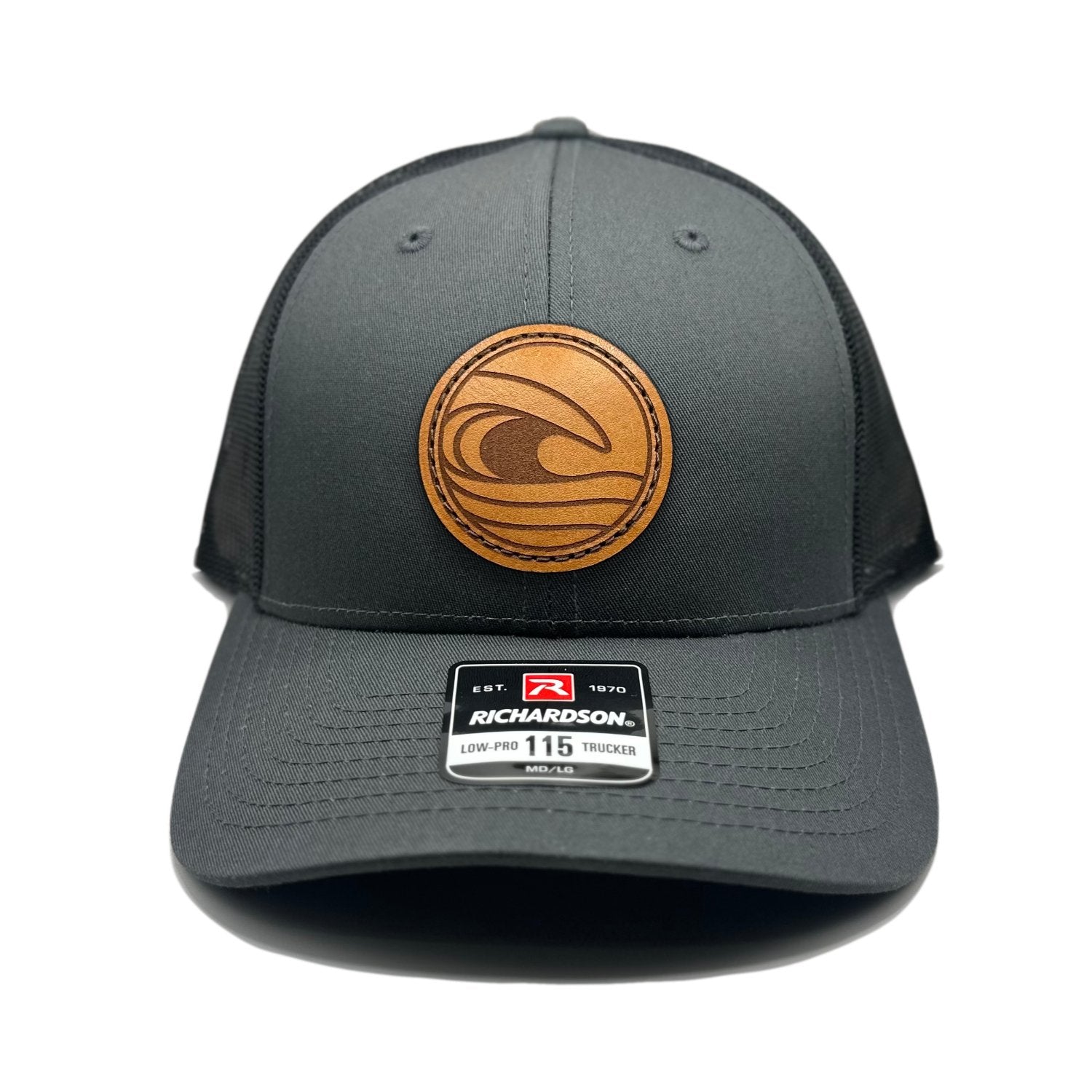 Front view of the Tidal Wave Leather Patch Hat by Outer Wings in Charcoal/Black, featuring a low profile, six-panel Richardson 115 hat with a genuine leather patch of an ocean wave design. Available in M/L and Small sizes.