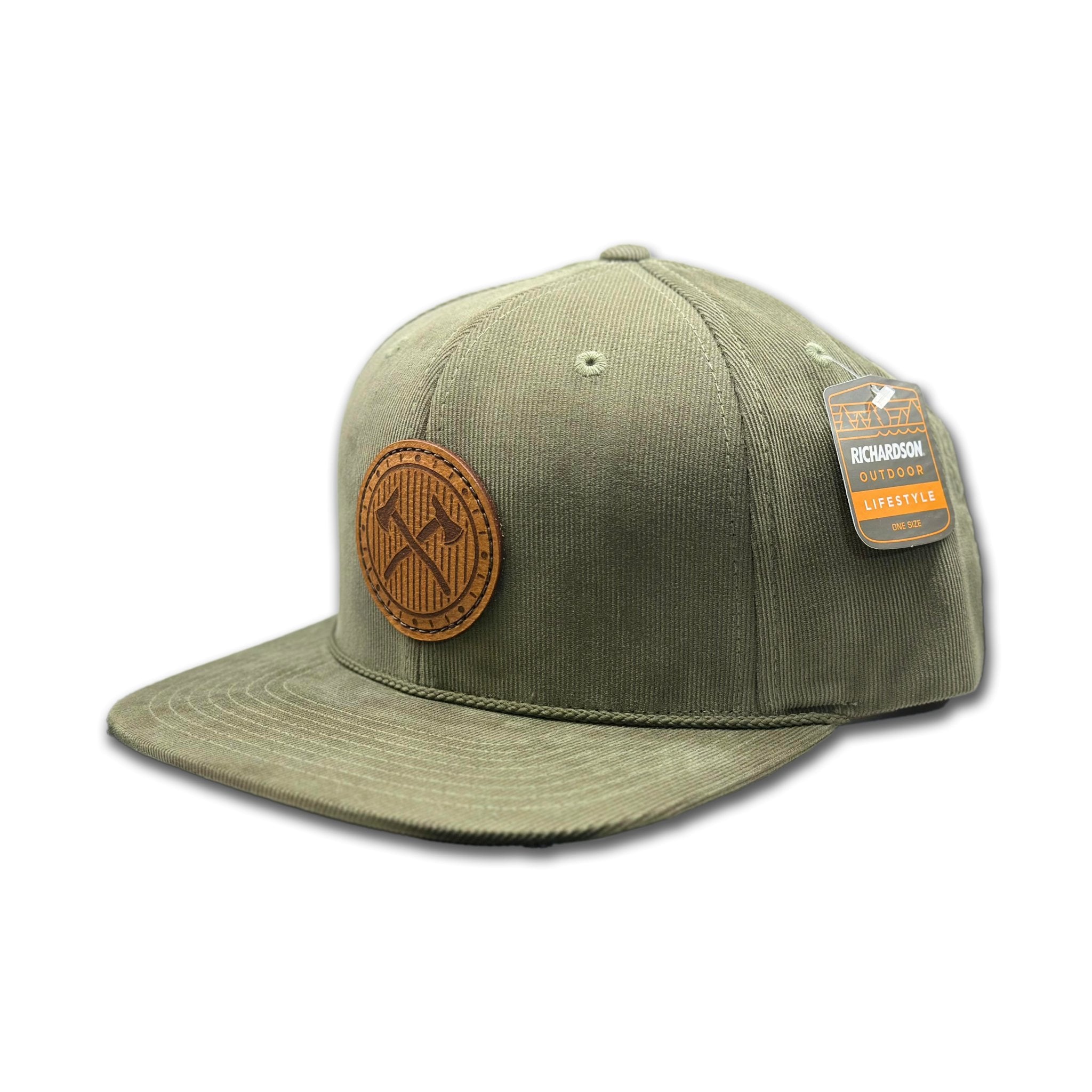 Side view of the Trailblazer Leather Patch Hat by Outer Wings in Olive, showcasing the soft corduroy fabric, flat bill, and rope hat snapback closure. A bold and durable hat for all outdoor adventures.