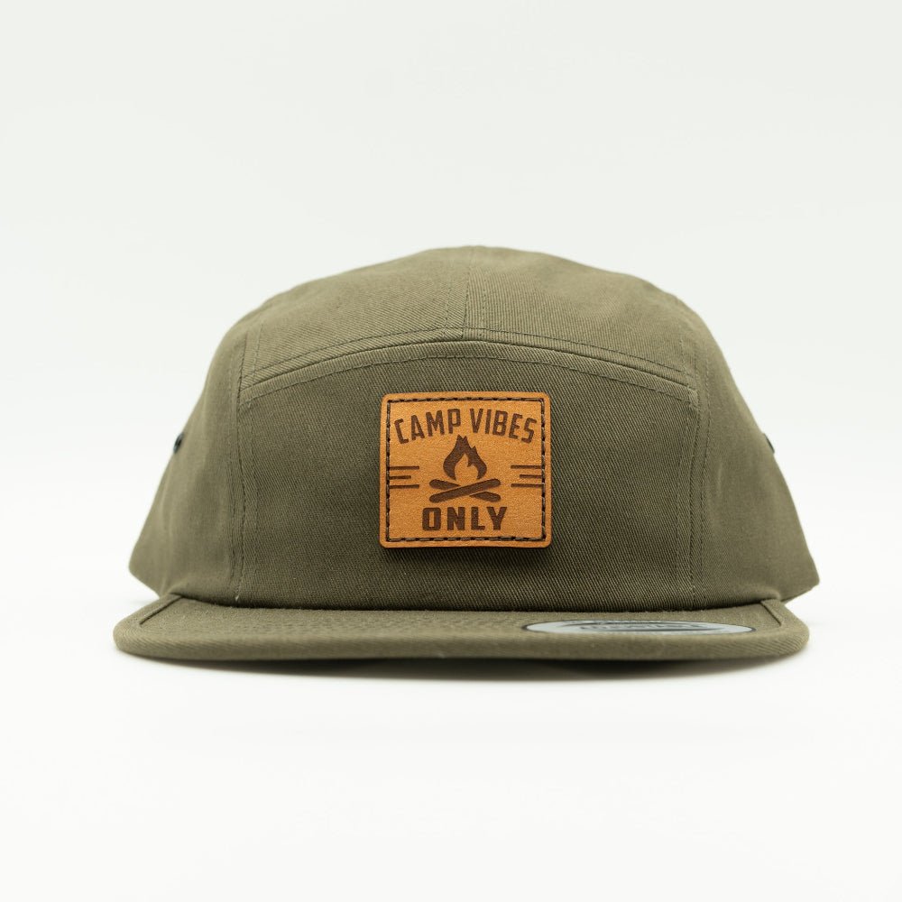 Front view of olive Yupoong 7005 camper hat with Camp Vibes Only engraved leather campfire patch and flat bill.

Color: Olive